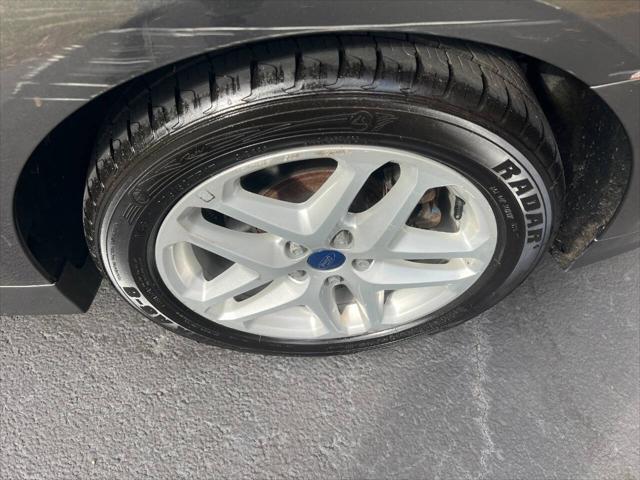 used 2016 Ford Fusion car, priced at $4,900