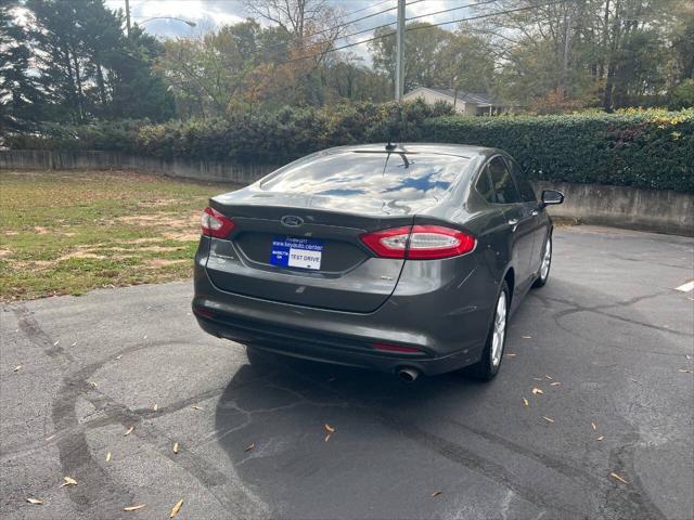 used 2016 Ford Fusion car, priced at $4,900