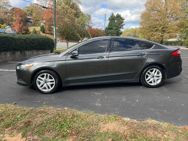 used 2016 Ford Fusion car, priced at $4,900