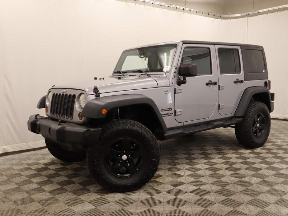 used 2013 Jeep Wrangler Unlimited car, priced at $16,995