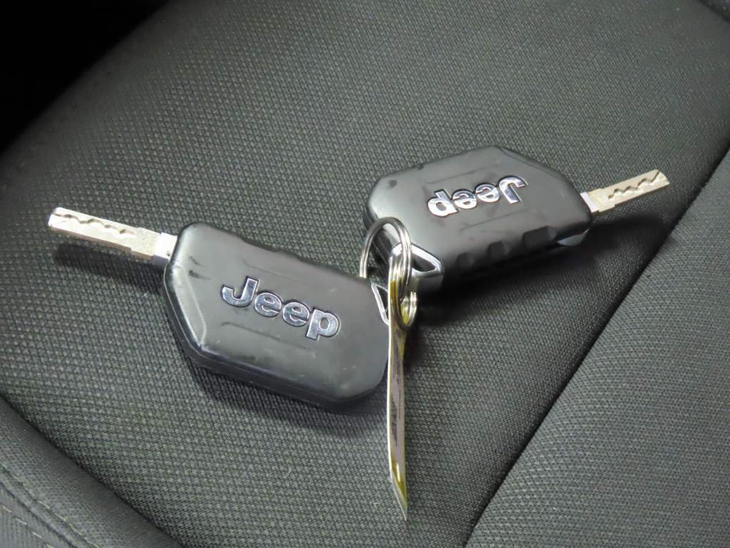 used 2021 Jeep Wrangler Unlimited car, priced at $26,839