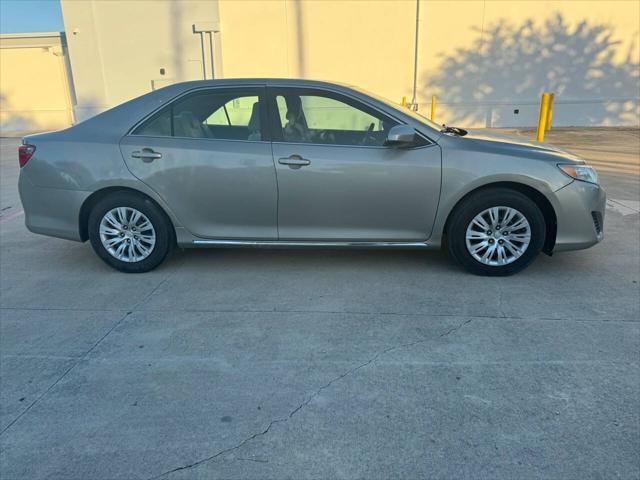 used 2014 Toyota Camry car, priced at $9,999