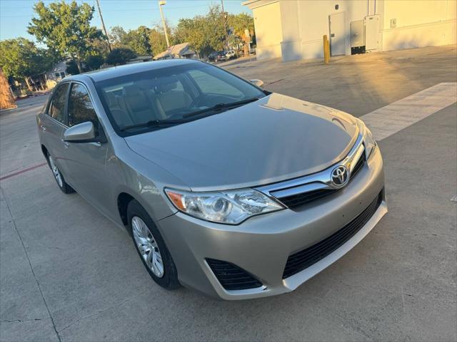 used 2014 Toyota Camry car, priced at $9,999