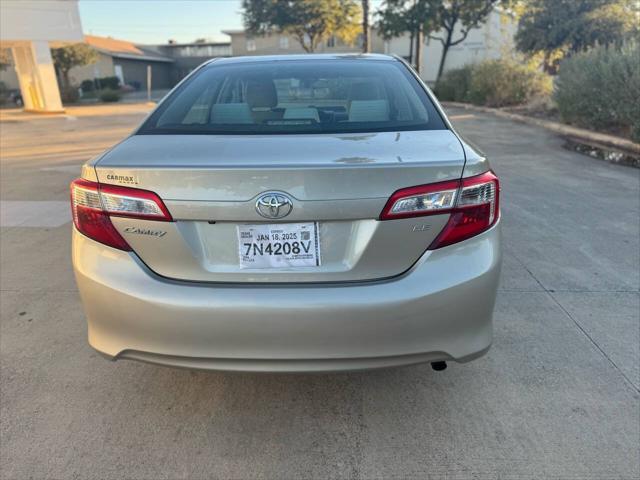 used 2014 Toyota Camry car, priced at $9,999