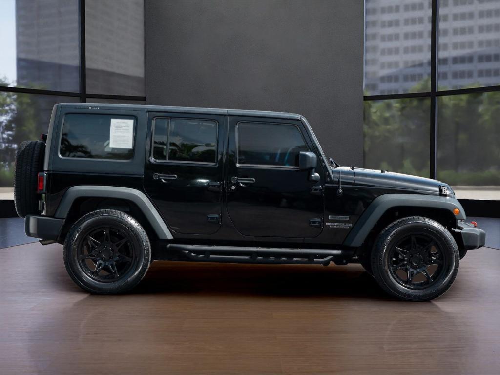 used 2015 Jeep Wrangler Unlimited car, priced at $16,336