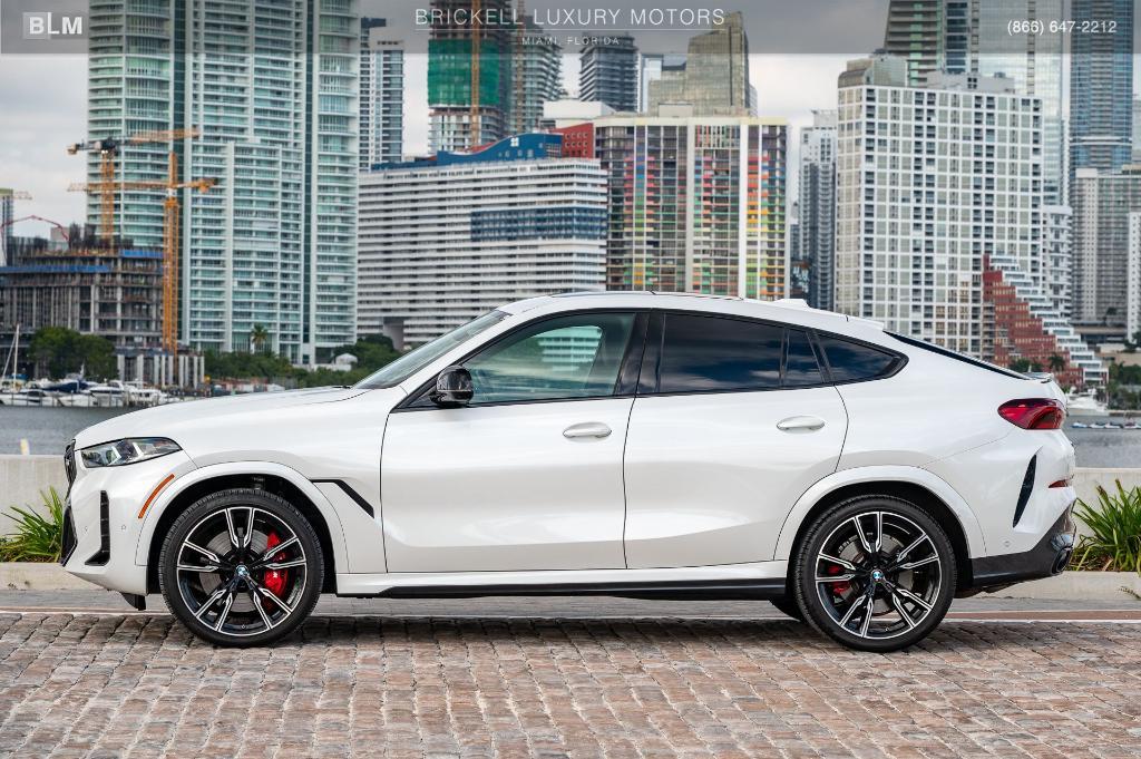 used 2025 BMW X6 car, priced at $87,296