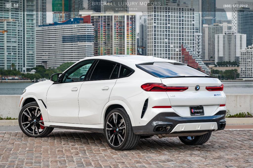 used 2025 BMW X6 car, priced at $87,296