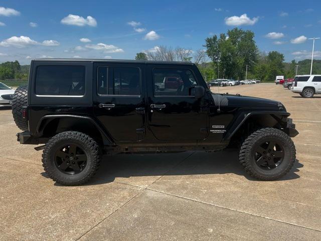 used 2012 Jeep Wrangler Unlimited car, priced at $12,419