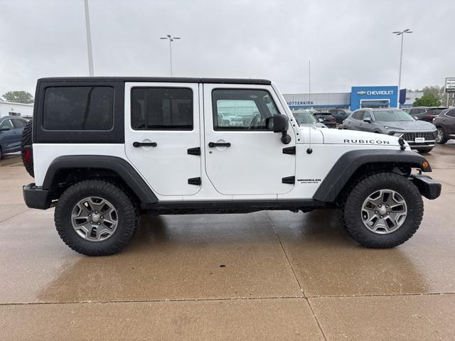 used 2015 Jeep Wrangler Unlimited car, priced at $20,961