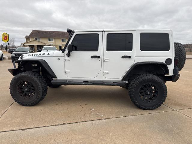 used 2011 Jeep Wrangler Unlimited car, priced at $13,844