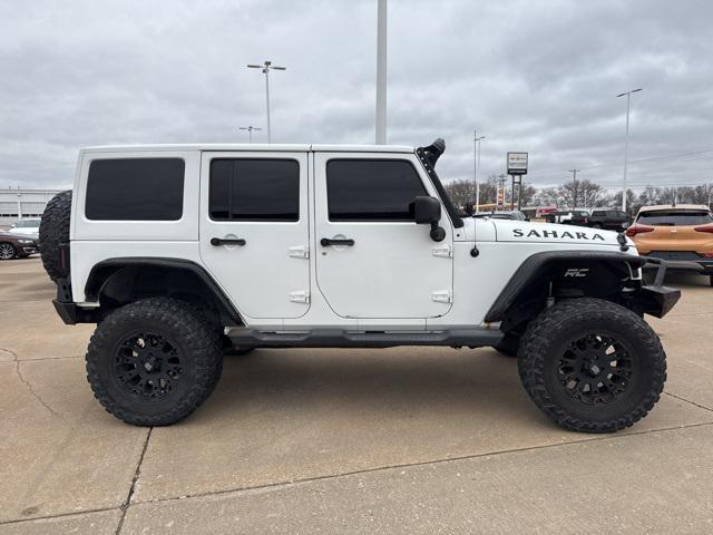 used 2011 Jeep Wrangler Unlimited car, priced at $13,844