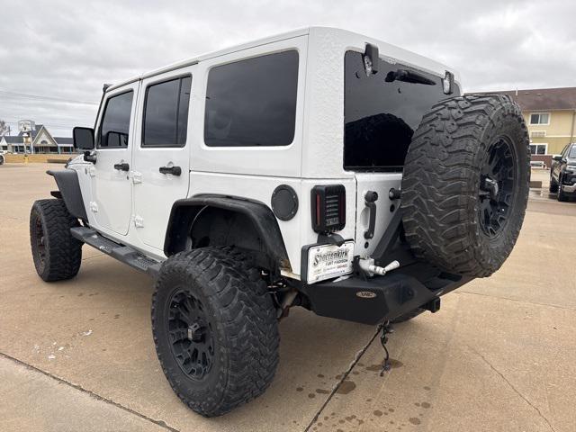 used 2011 Jeep Wrangler Unlimited car, priced at $13,844