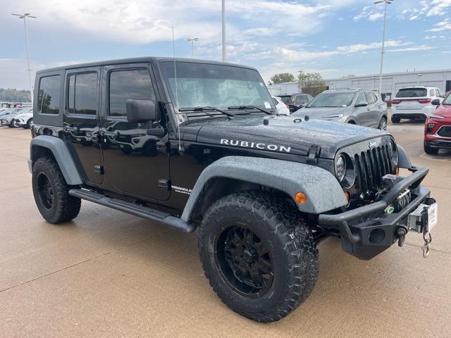 used 2009 Jeep Wrangler Unlimited car, priced at $13,415