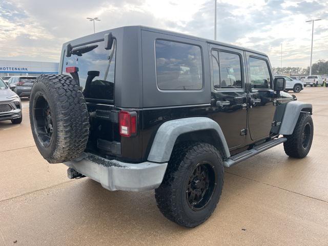 used 2009 Jeep Wrangler Unlimited car, priced at $13,415