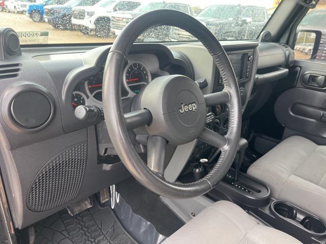 used 2009 Jeep Wrangler Unlimited car, priced at $13,415