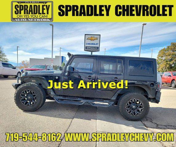 used 2018 Jeep Wrangler JK Unlimited car, priced at $23,681