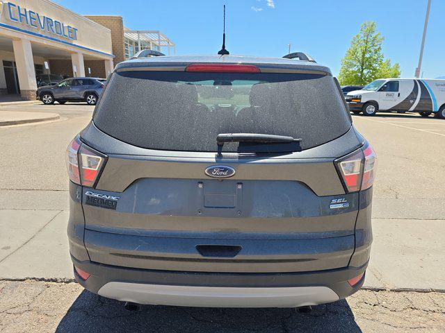 used 2018 Ford Escape car, priced at $10,681