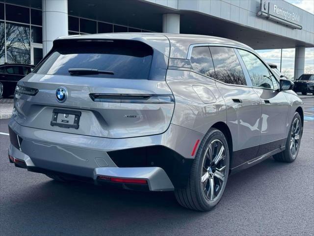 new 2024 BMW iX car, priced at $97,695