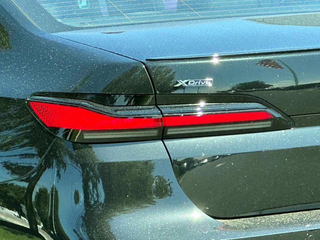 new 2025 BMW 740 car, priced at $107,300
