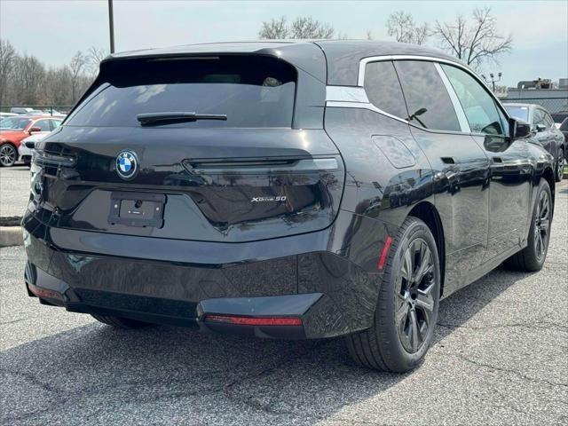 new 2024 BMW iX car, priced at $95,340