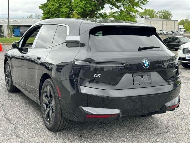 new 2025 BMW iX car, priced at $98,470