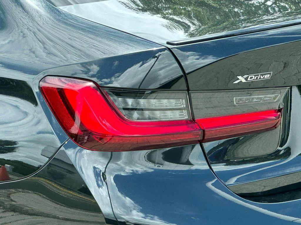 new 2025 BMW 330 car, priced at $53,975