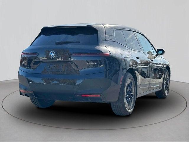 new 2025 BMW iX car, priced at $97,620