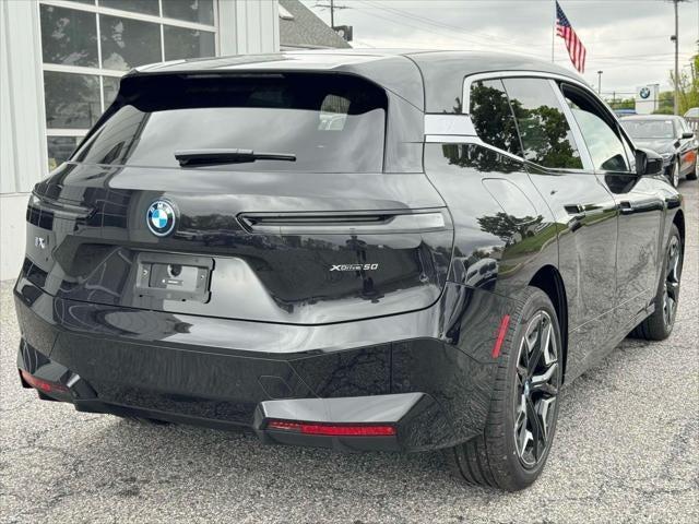 new 2025 BMW iX car, priced at $97,020