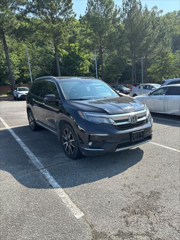 used 2021 Honda Pilot car, priced at $26,580