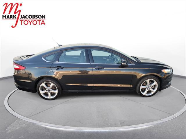 used 2015 Ford Fusion car, priced at $12,500