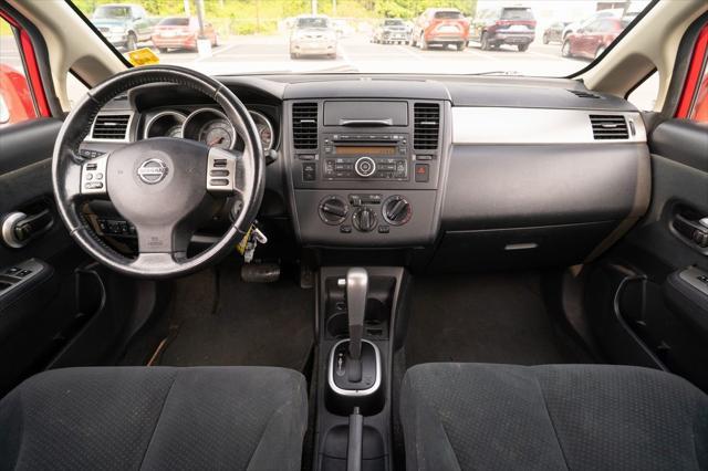 used 2012 Nissan Versa car, priced at $5,800