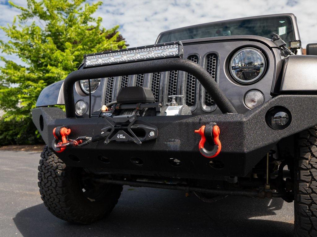 used 2014 Jeep Wrangler Unlimited car, priced at $25,000