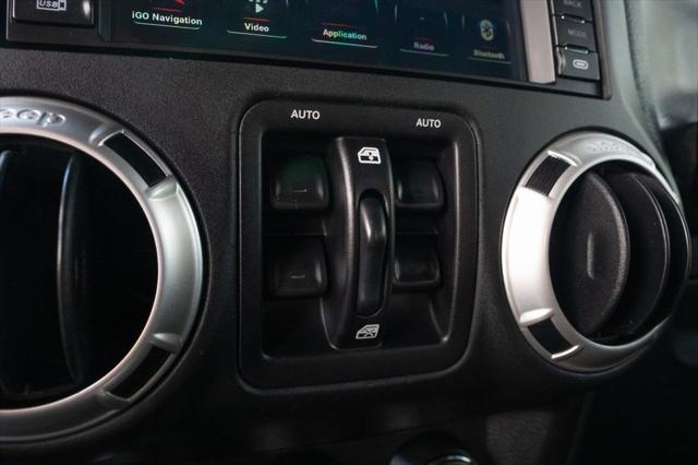 used 2016 Jeep Wrangler Unlimited car, priced at $23,500