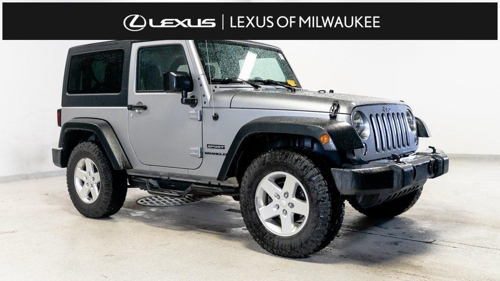 used 2015 Jeep Wrangler car, priced at $18,300