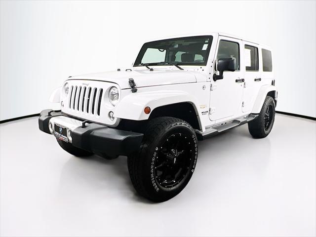 used 2015 Jeep Wrangler Unlimited car, priced at $22,846