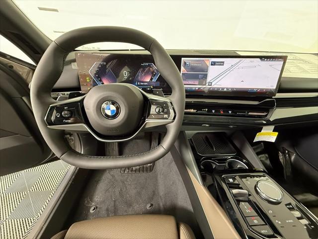 new 2025 BMW 530 car, priced at $64,025