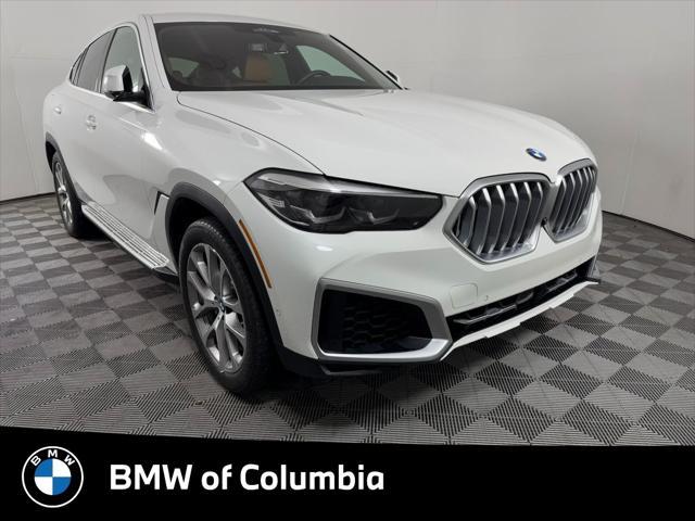 used 2022 BMW X6 car, priced at $55,213