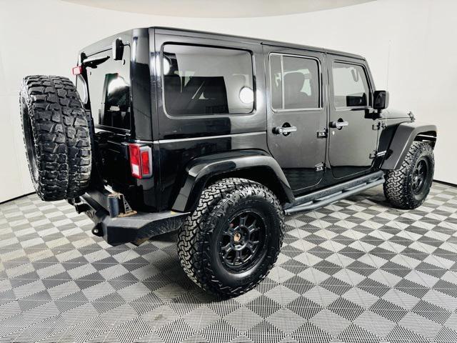 used 2012 Jeep Wrangler Unlimited car, priced at $18,996