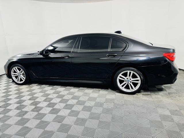used 2016 BMW 750 car, priced at $22,547