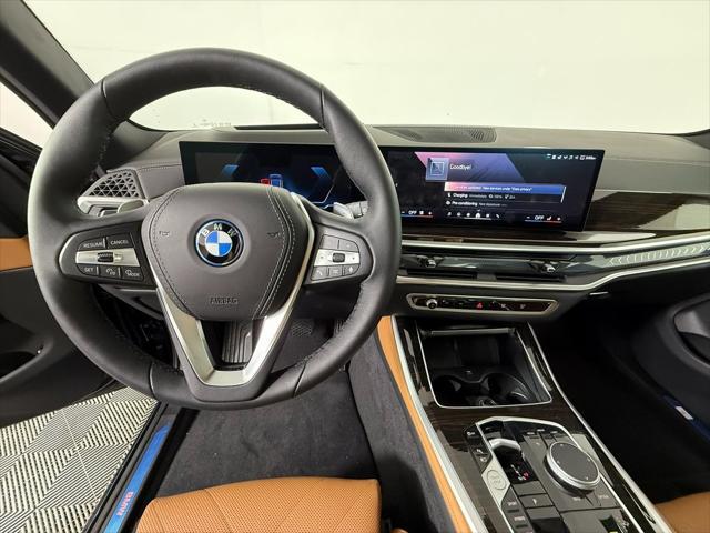 used 2025 BMW X5 PHEV car, priced at $72,998