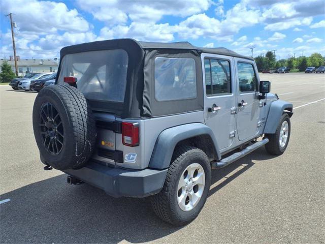 used 2013 Jeep Wrangler Unlimited car, priced at $12,984