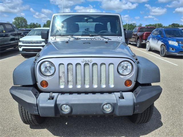 used 2013 Jeep Wrangler Unlimited car, priced at $12,984
