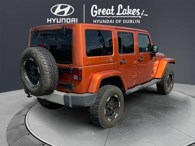 used 2011 Jeep Wrangler Unlimited car, priced at $15,466