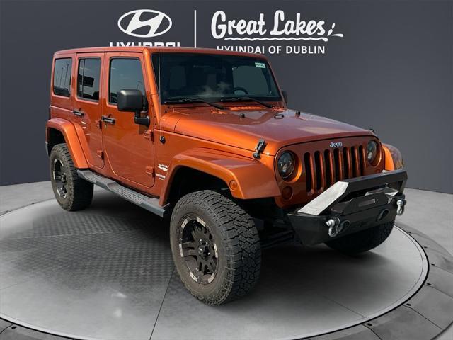 used 2011 Jeep Wrangler Unlimited car, priced at $15,466