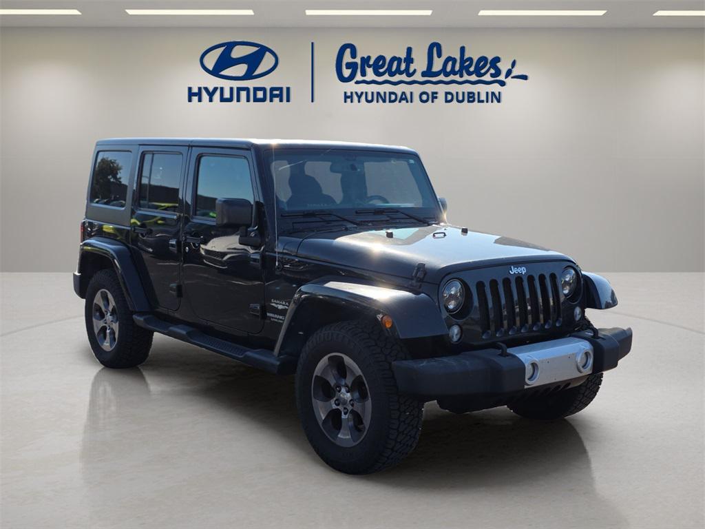used 2014 Jeep Wrangler Unlimited car, priced at $13,966