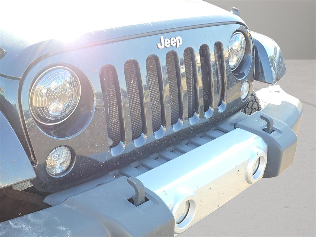 used 2014 Jeep Wrangler Unlimited car, priced at $13,966