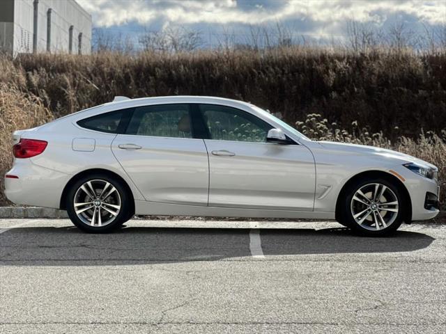 used 2018 BMW 330 car, priced at $18,287