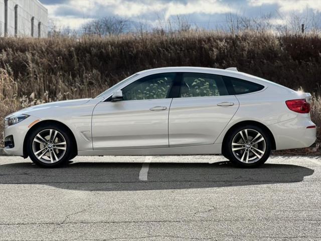 used 2018 BMW 330 car, priced at $16,487