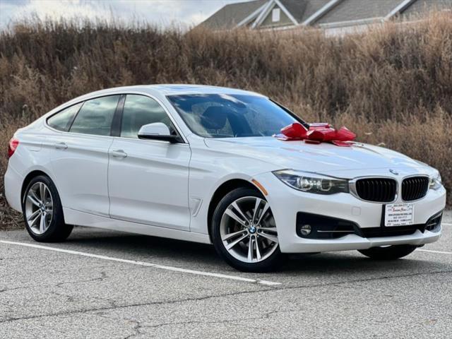 used 2018 BMW 330 car, priced at $16,487