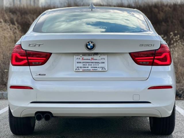 used 2018 BMW 330 car, priced at $18,287